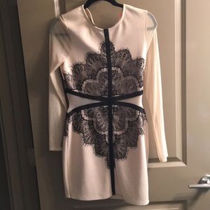 Nude and black lace cocktail dress